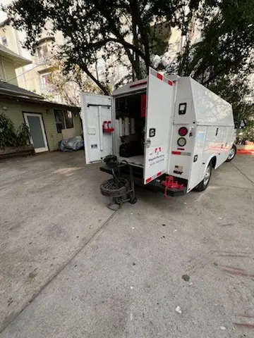 Magnet Plumbing service vehicle on-site for Water Heater Repair in Deerfield Beach